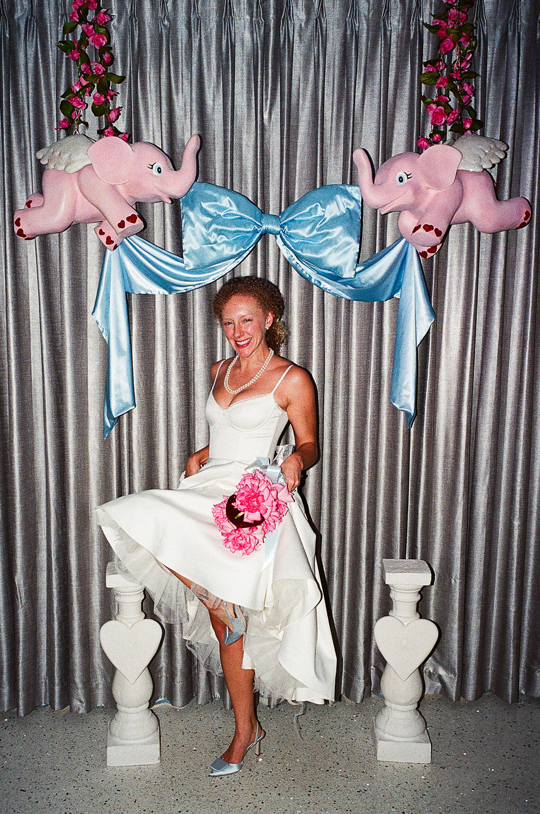playful bride portrait at Sure Thing Chapel Las Vegas elopement with retro decor